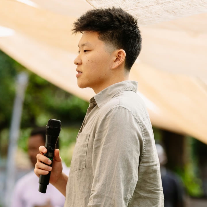 Nate Herk speaking at an event